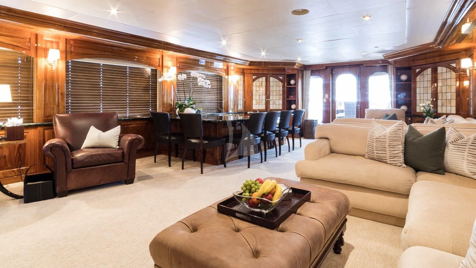 a living room with a couch and a coffee table aboard POPEYE Yacht for Sale