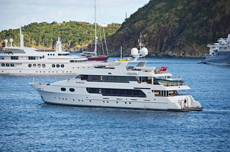 a group of white yachts in the water aboard POPEYE Yacht for Sale