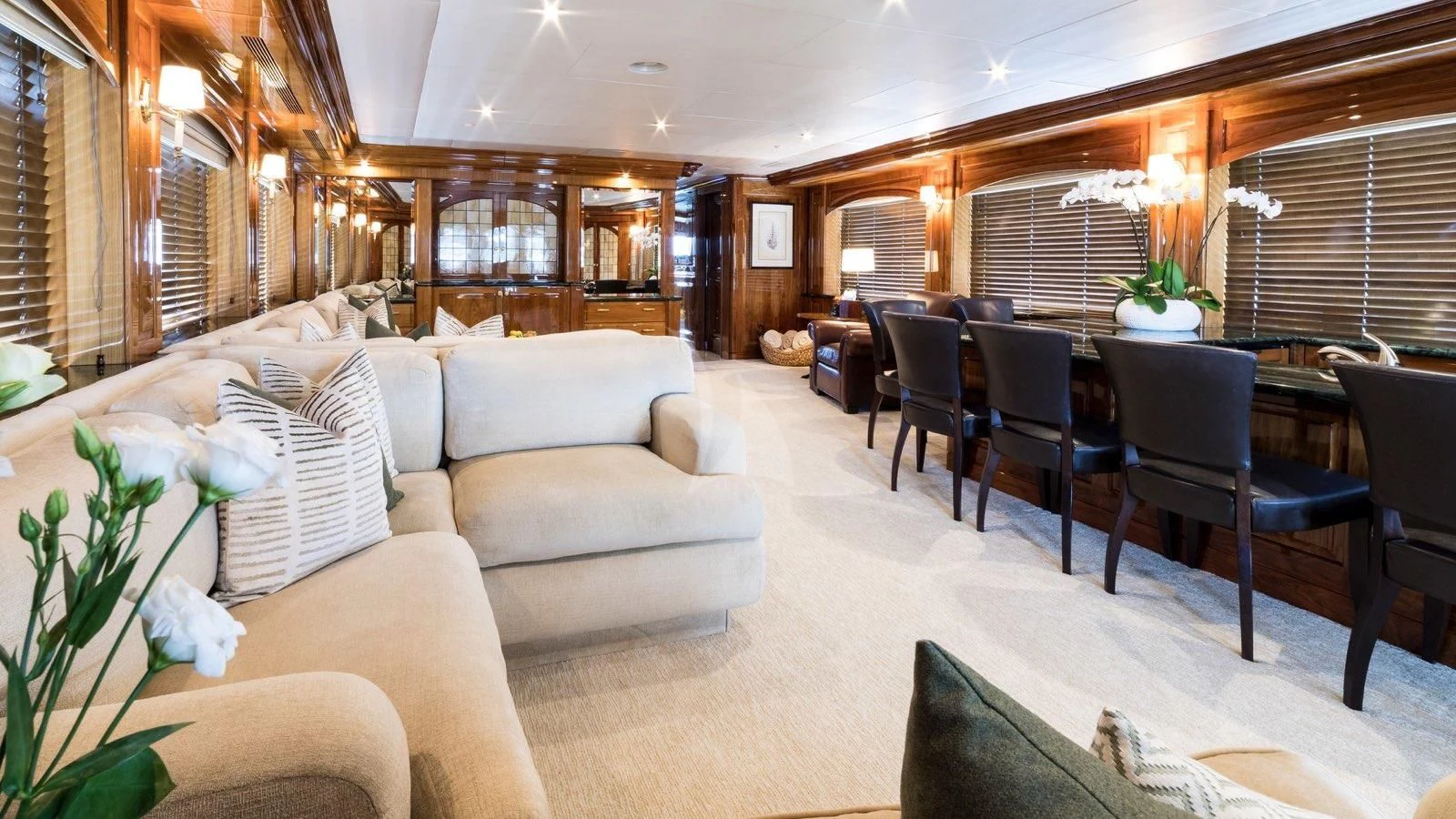 a living room with a couch and a table aboard POPEYE Yacht for Sale
