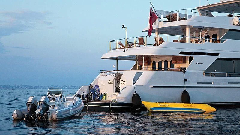 a boat docked at a pier aboard POPEYE Yacht for Sale