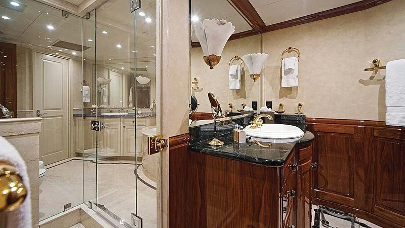 a bathroom with a glass shower aboard POPEYE Yacht for Sale