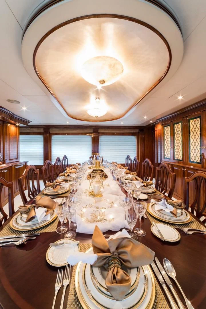 a large dining room table aboard POPEYE Yacht for Sale