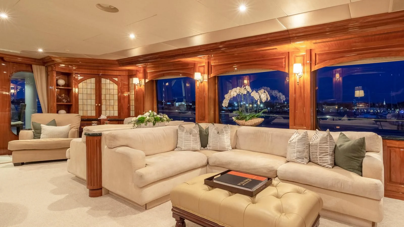 a living room with a large screen aboard POPEYE Yacht for Sale