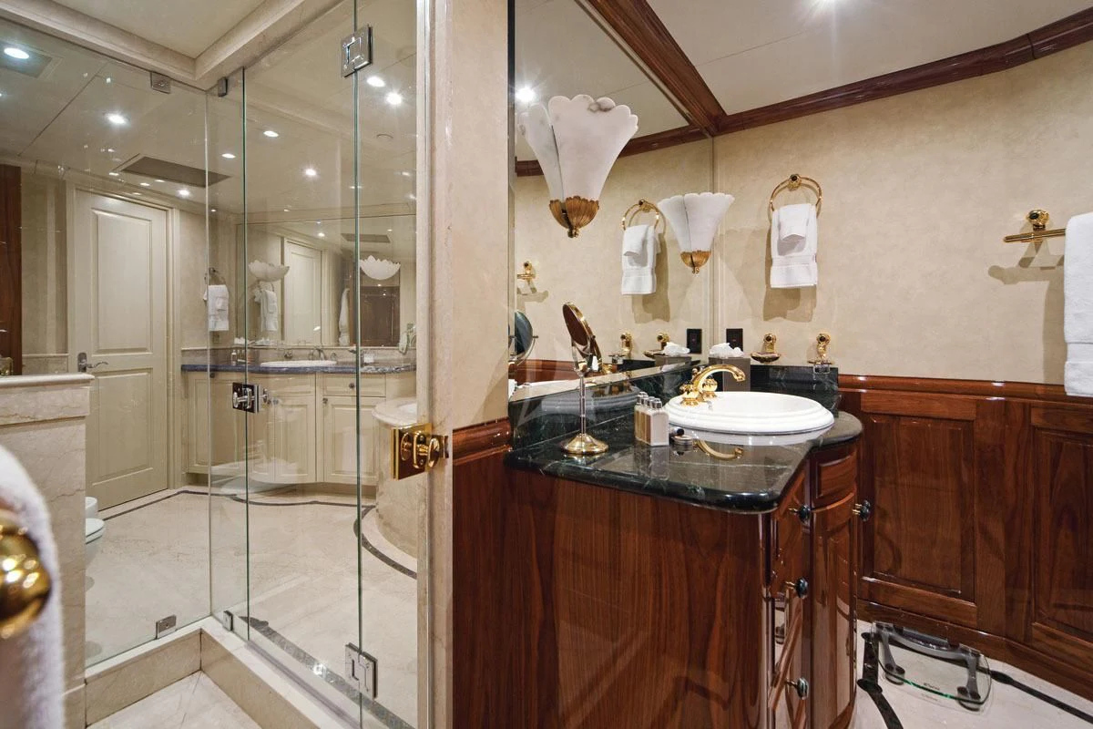 a bathroom with a glass shower aboard POPEYE Yacht for Sale