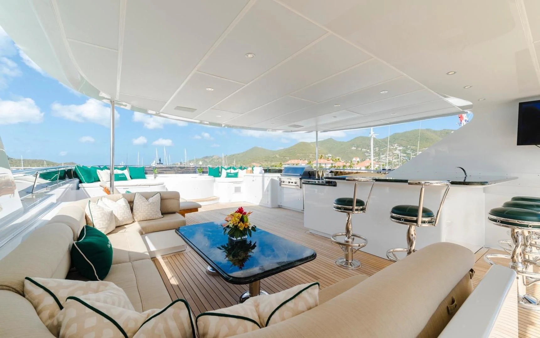 a large living room with a large patio and a pool aboard POPEYE Yacht for Sale