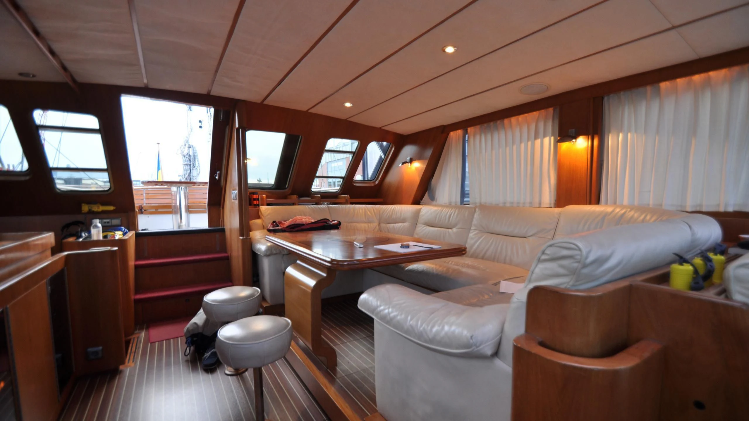 a living room with a couch and a table aboard ISABEL Yacht for Sale