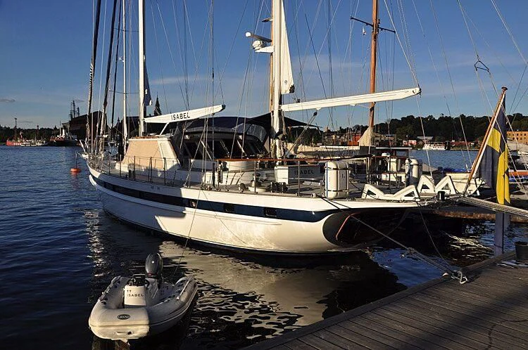 a boat docked at a pier aboard ISABEL Yacht for Sale