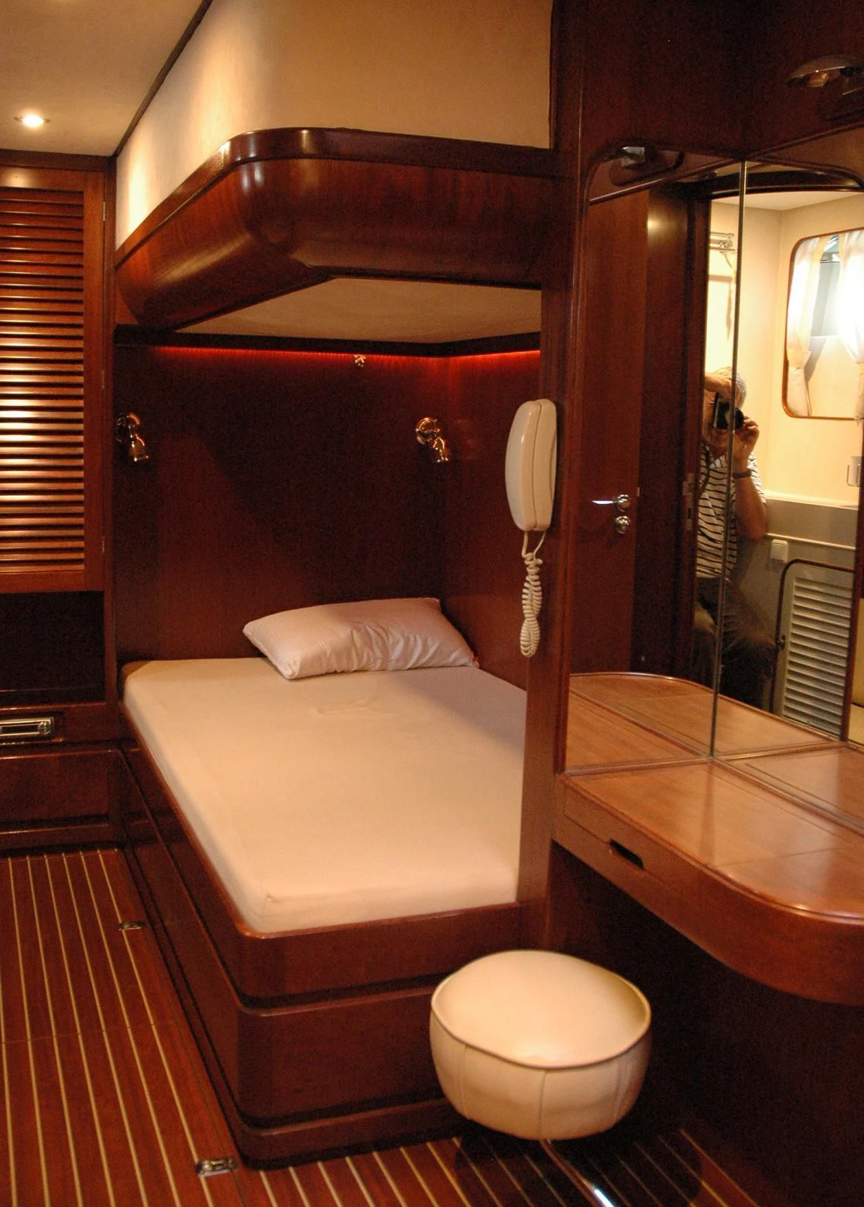 a bathroom with a mirror and a sink aboard ISABEL Yacht for Sale