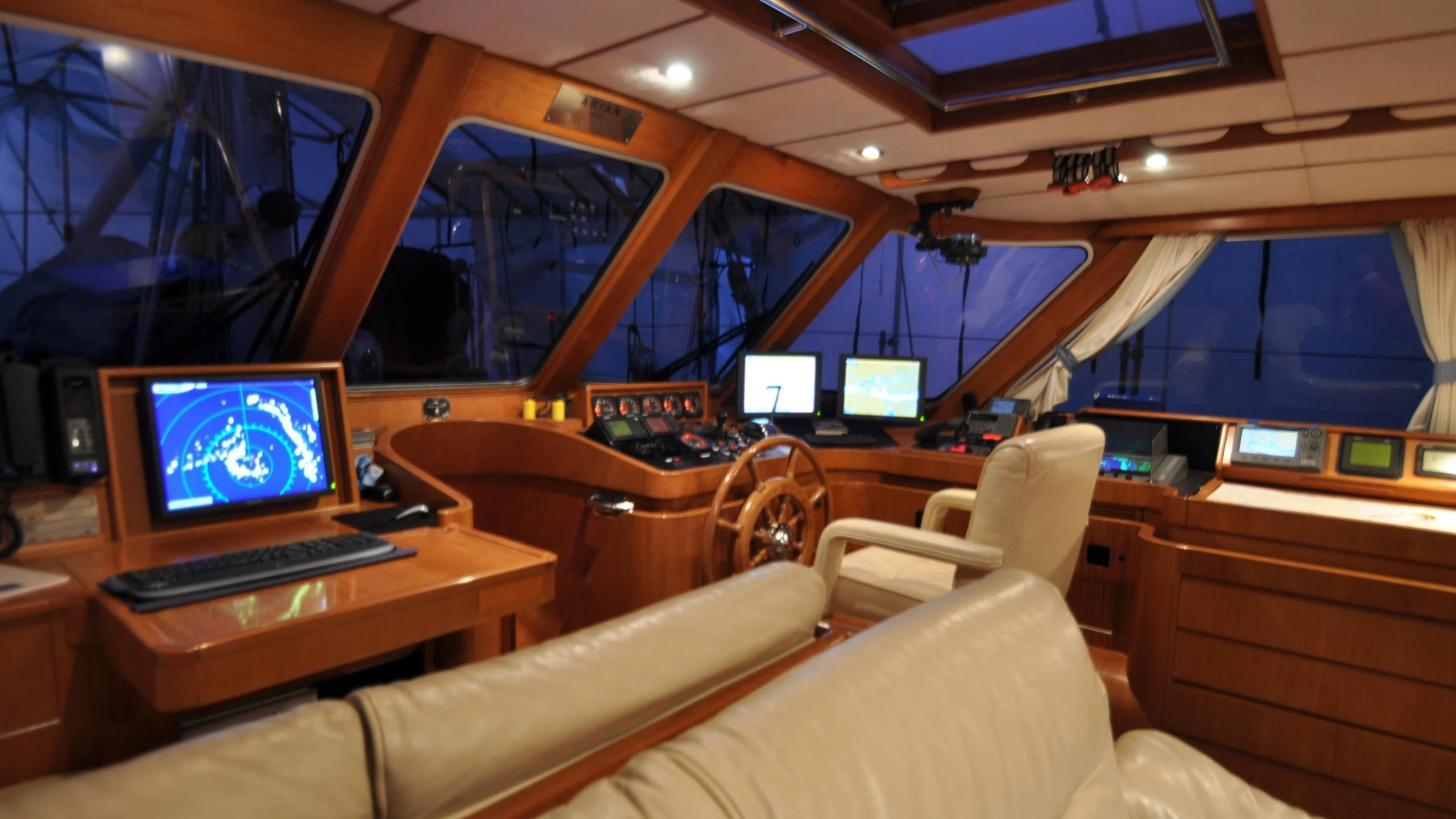 a room with a desk and a computer aboard ISABEL Yacht for Sale