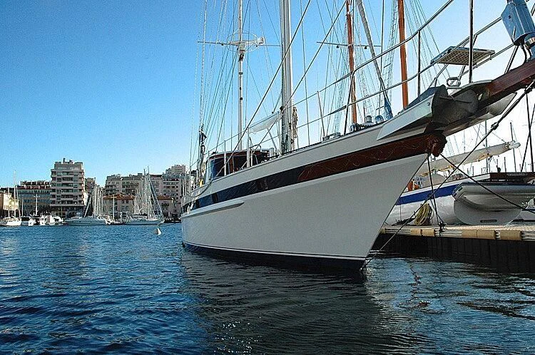 a boat docked at a pier aboard ISABEL Yacht for Sale