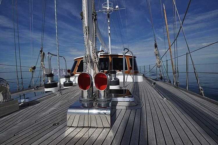 a wooden dock with a boat on it aboard ISABEL Yacht for Sale