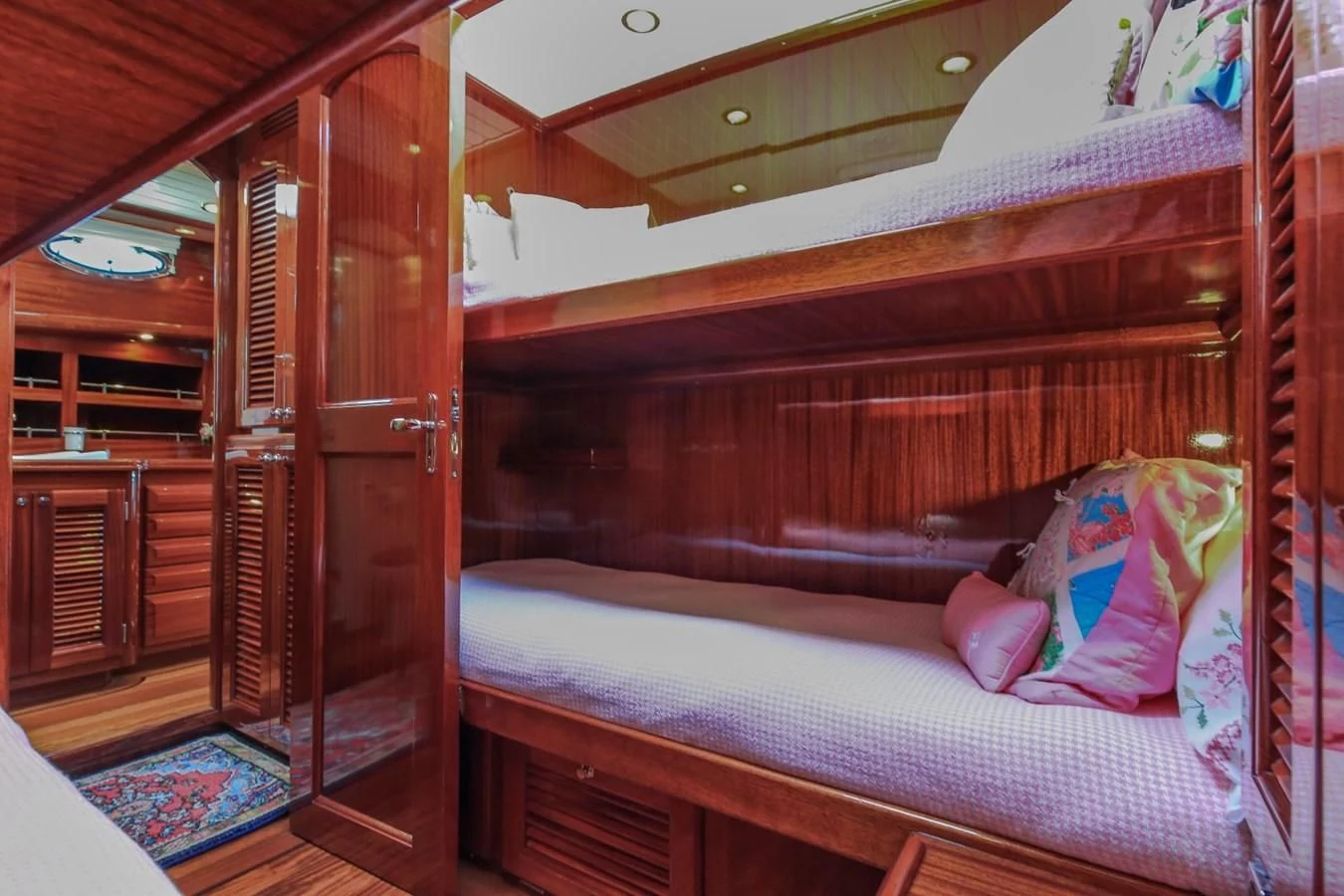 a bed in a room aboard REVELRY Yacht for Sale