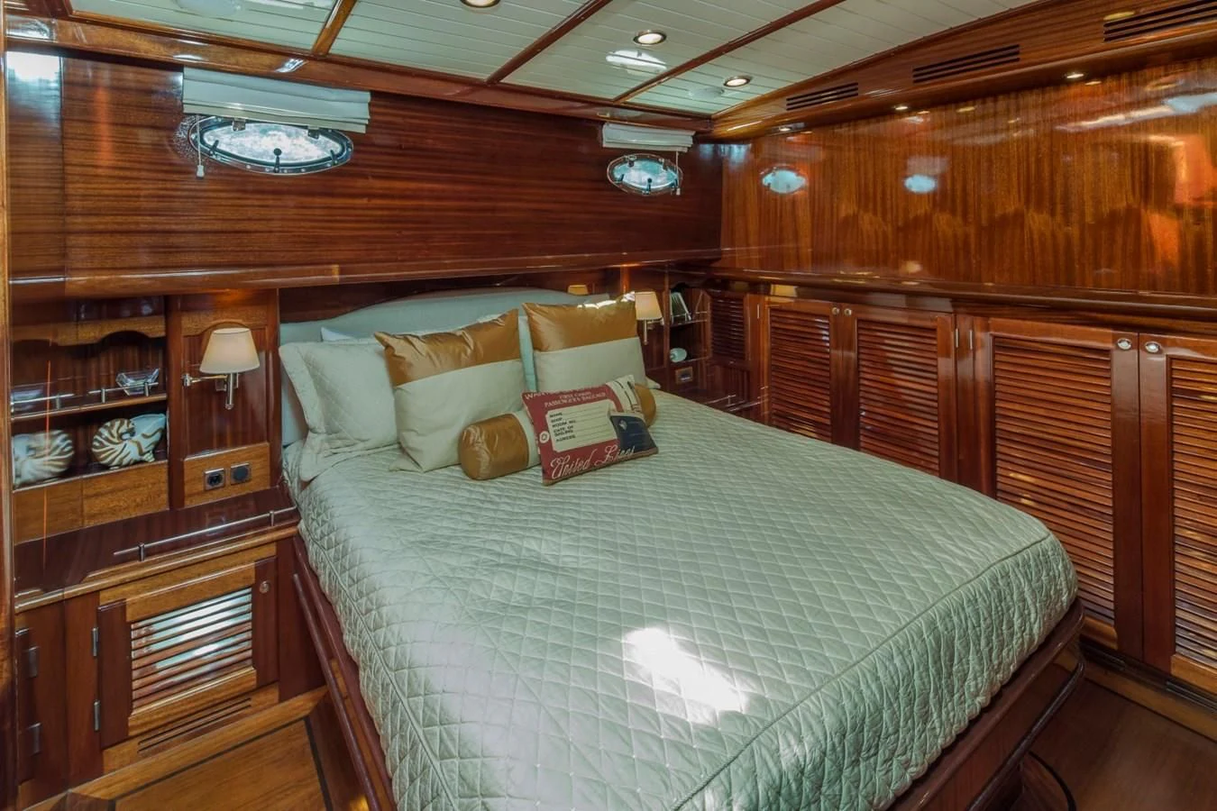 a bed in a cabin aboard REVELRY Yacht for Sale