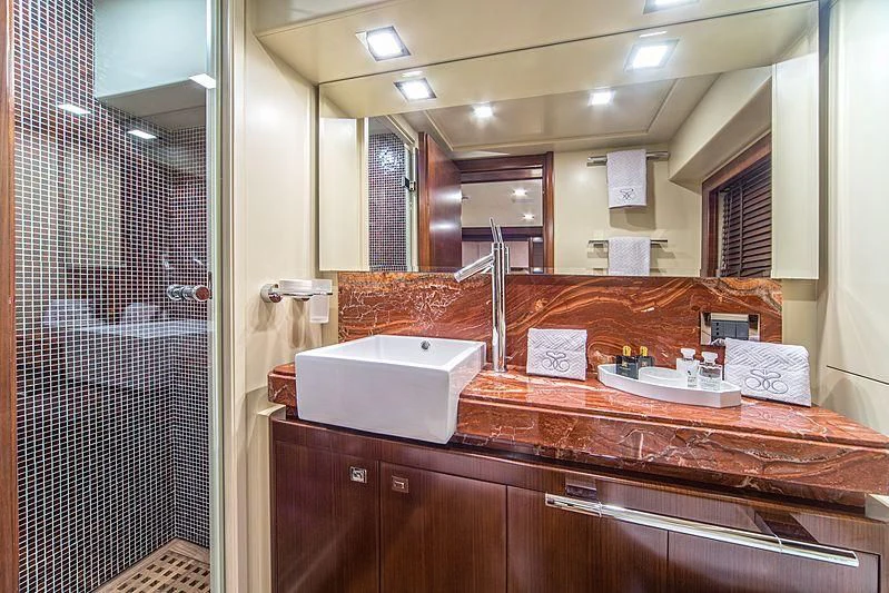 a bathroom with a large mirror aboard SEVENTH SENSE Yacht for Charter