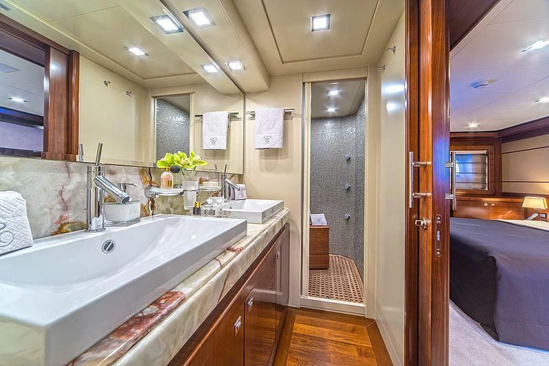 a bathroom with a large bathtub aboard SEVENTH SENSE Yacht for Charter
