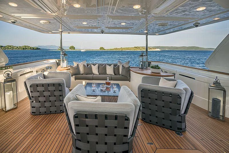 a living room with a large pool aboard SEVENTH SENSE Yacht for Charter