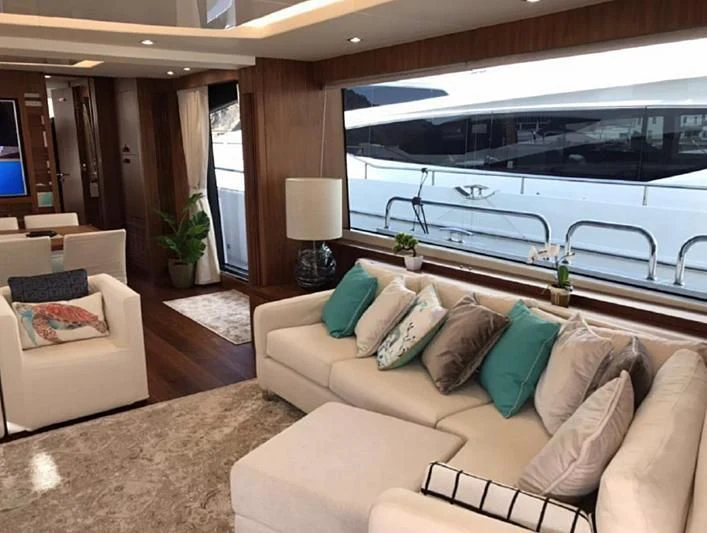 a living room with a large cruise ship aboard ZODIAC Yacht for Sale