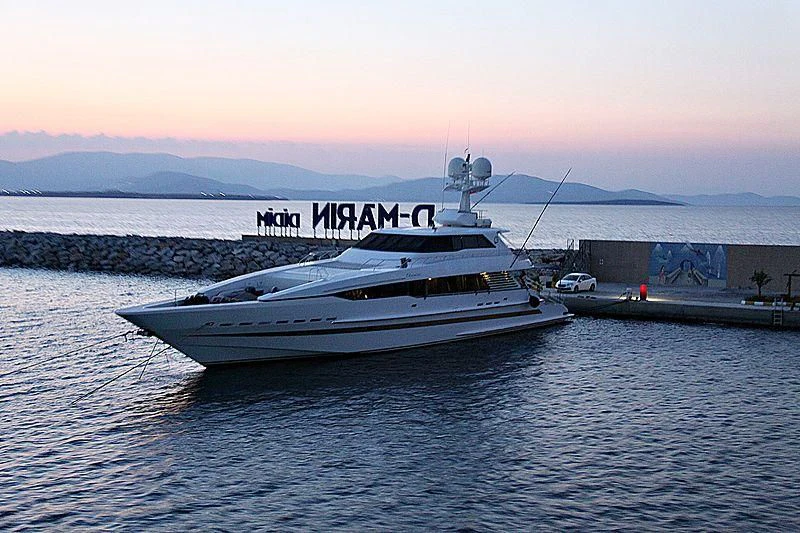 a boat on the water aboard OBSESSIONS Yacht for Sale