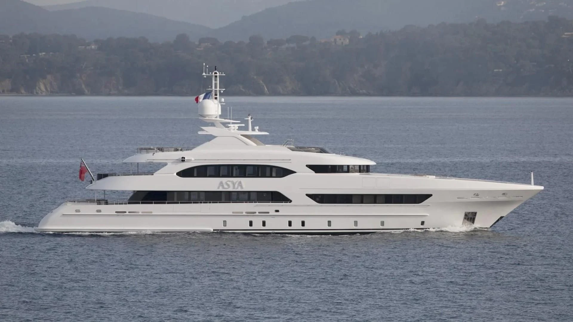 a white yacht on the water aboard ASYA Yacht for Sale