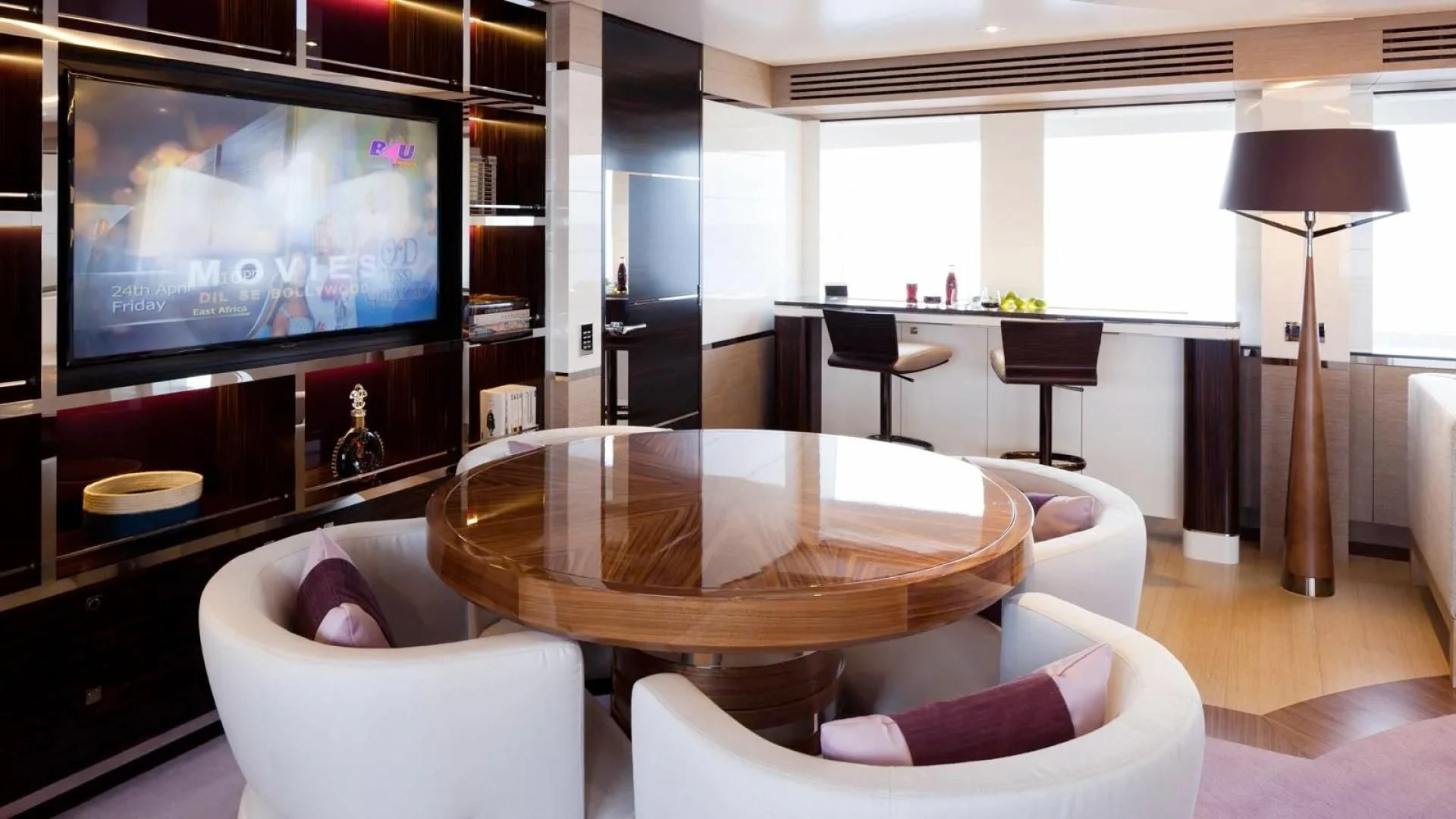 a living room with a table and chairs aboard ASYA Yacht for Sale