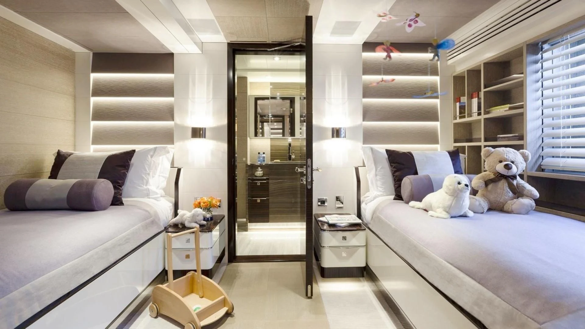 a bedroom with a bed and a desk aboard ASYA Yacht for Sale