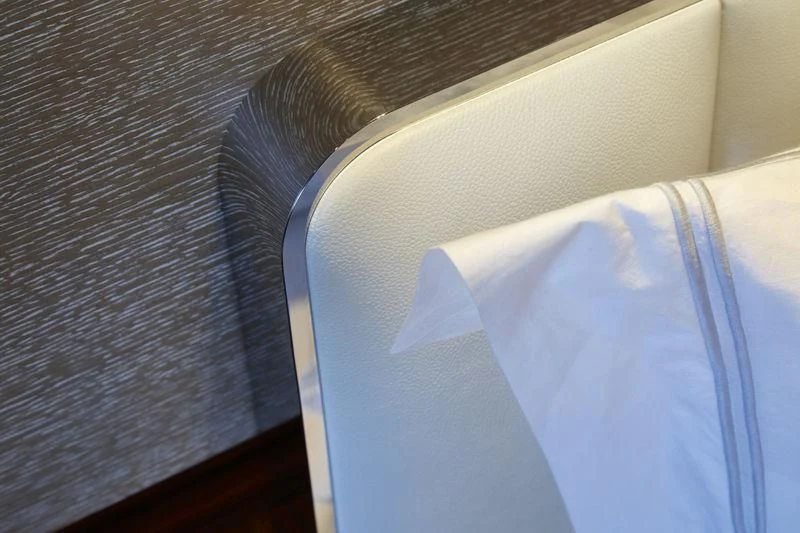 a white sheet of paper on a wooden surface aboard ASYA Yacht for Sale