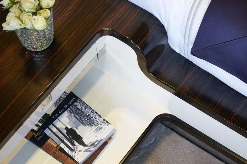 a tablet on a table aboard ASYA Yacht for Sale