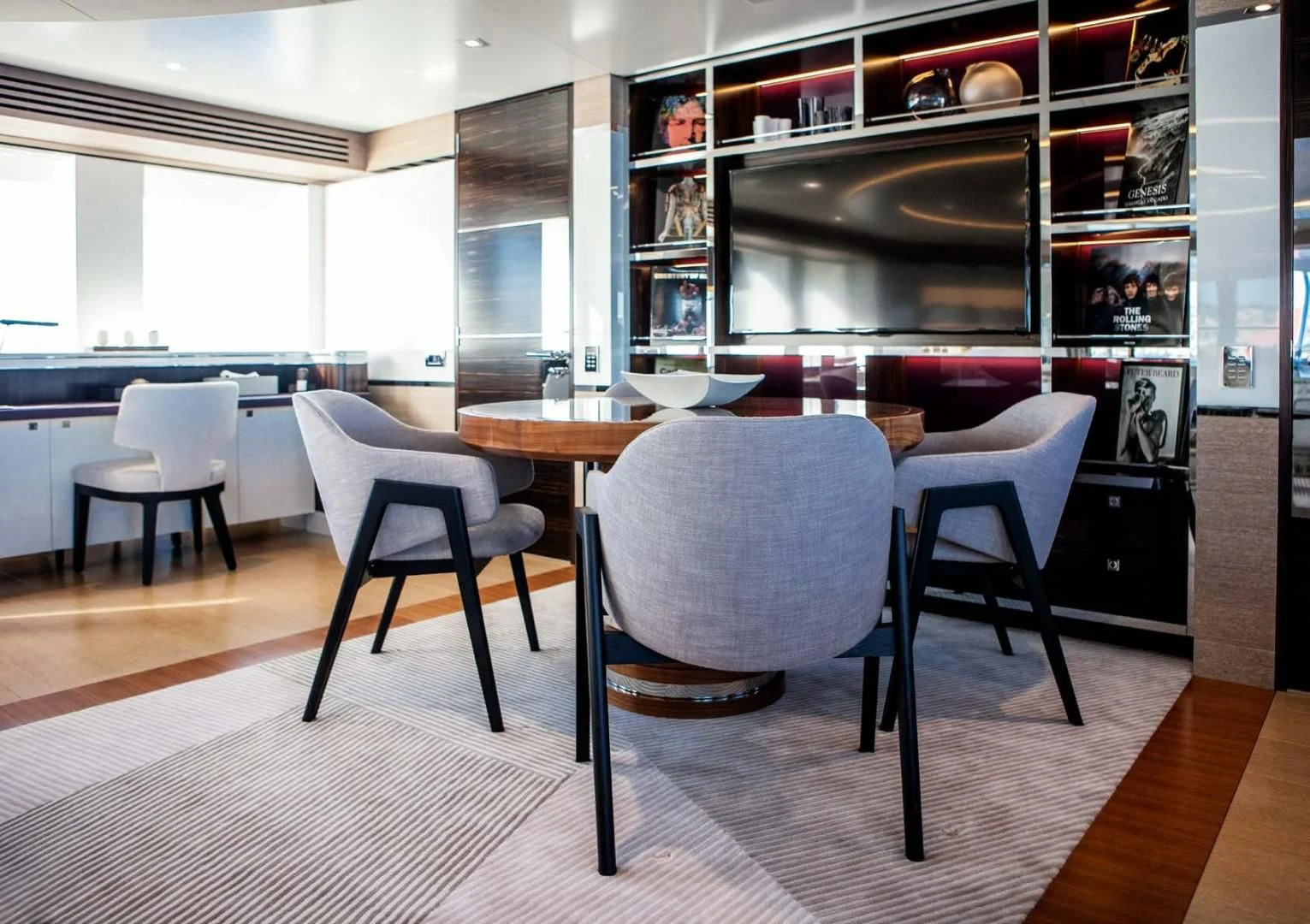 a dining room with a table and chairs aboard ASYA Yacht for Sale