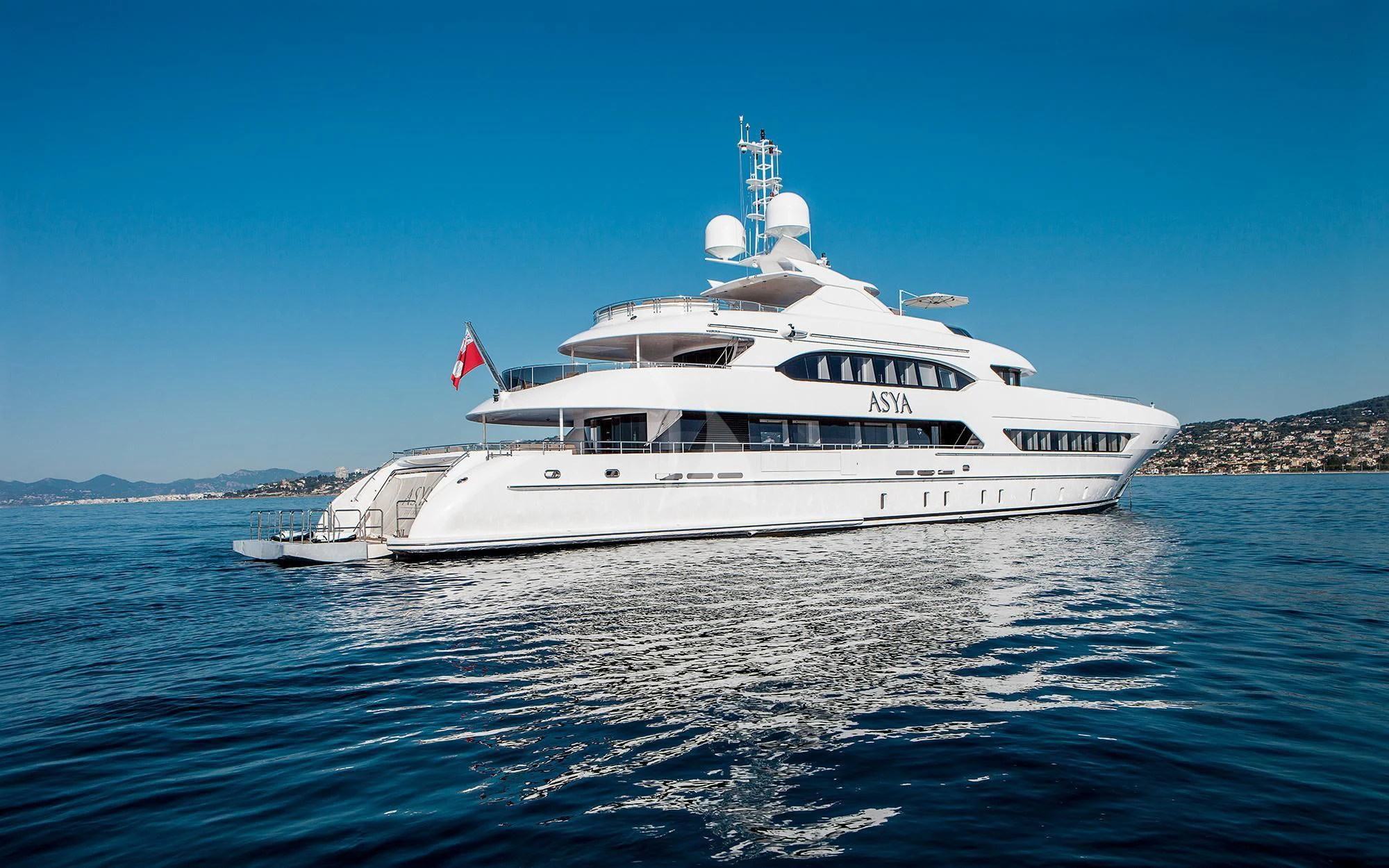 a large white boat on the water aboard ASYA Yacht for Sale