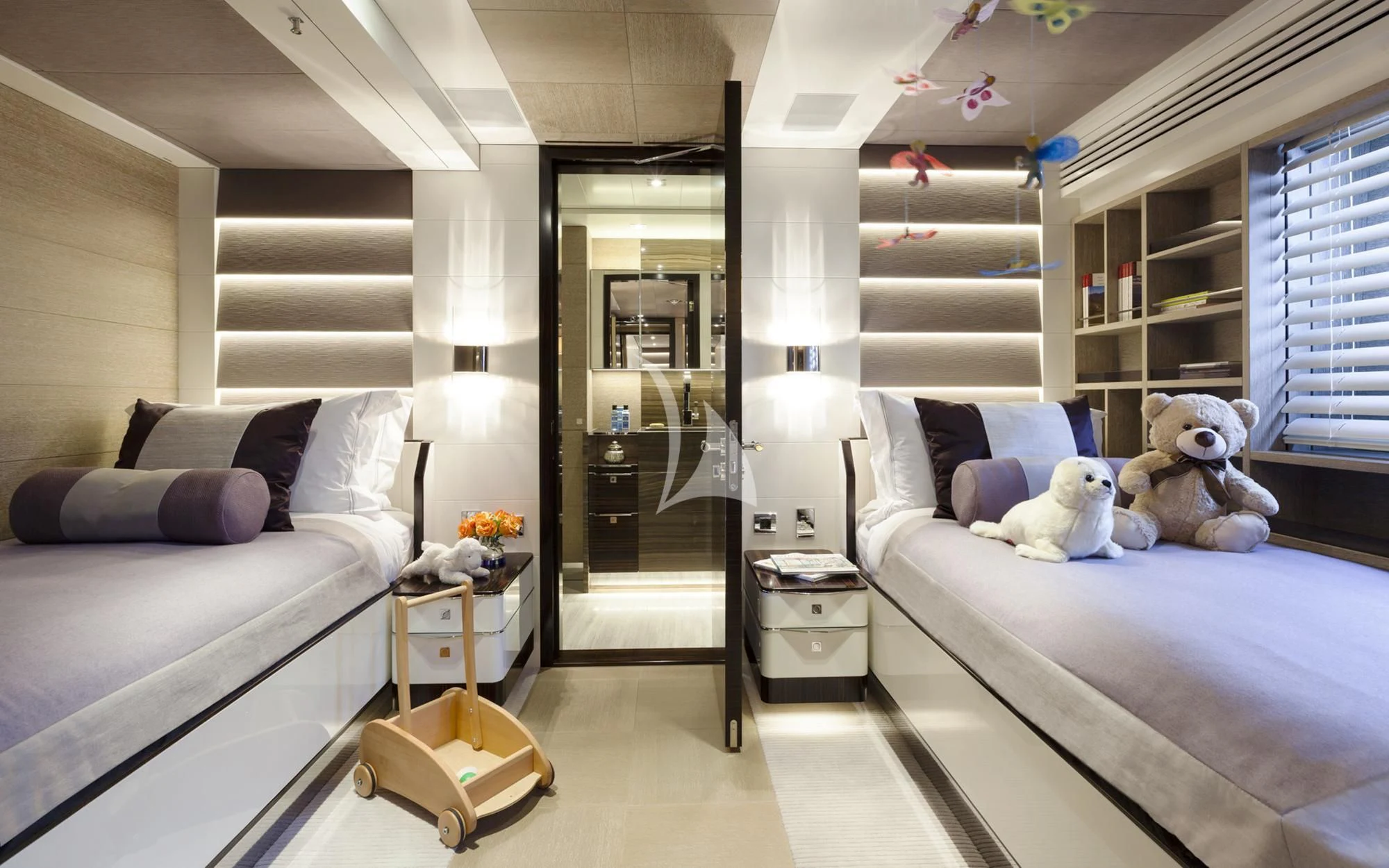 a bedroom with a bed and a desk aboard ASYA Yacht for Sale