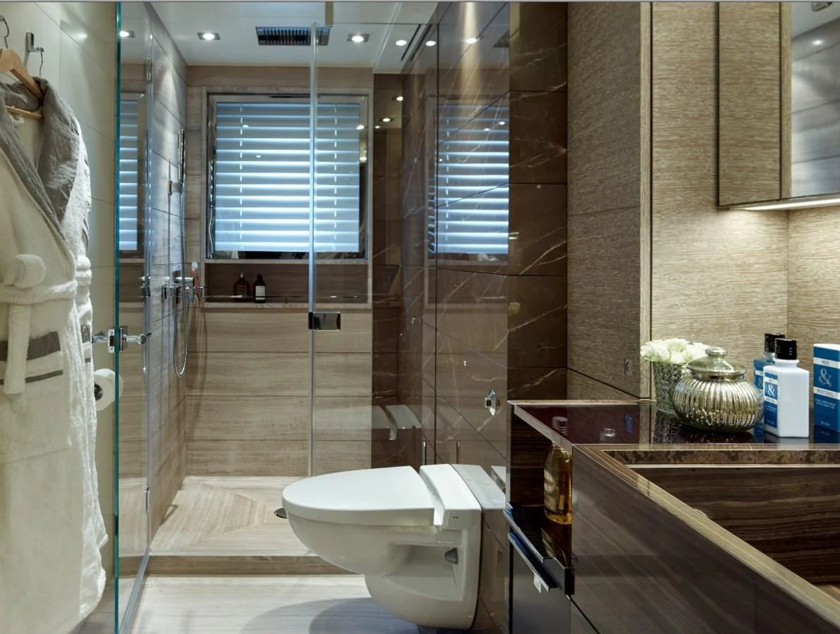 a bathroom with a glass shower aboard ASYA Yacht for Sale