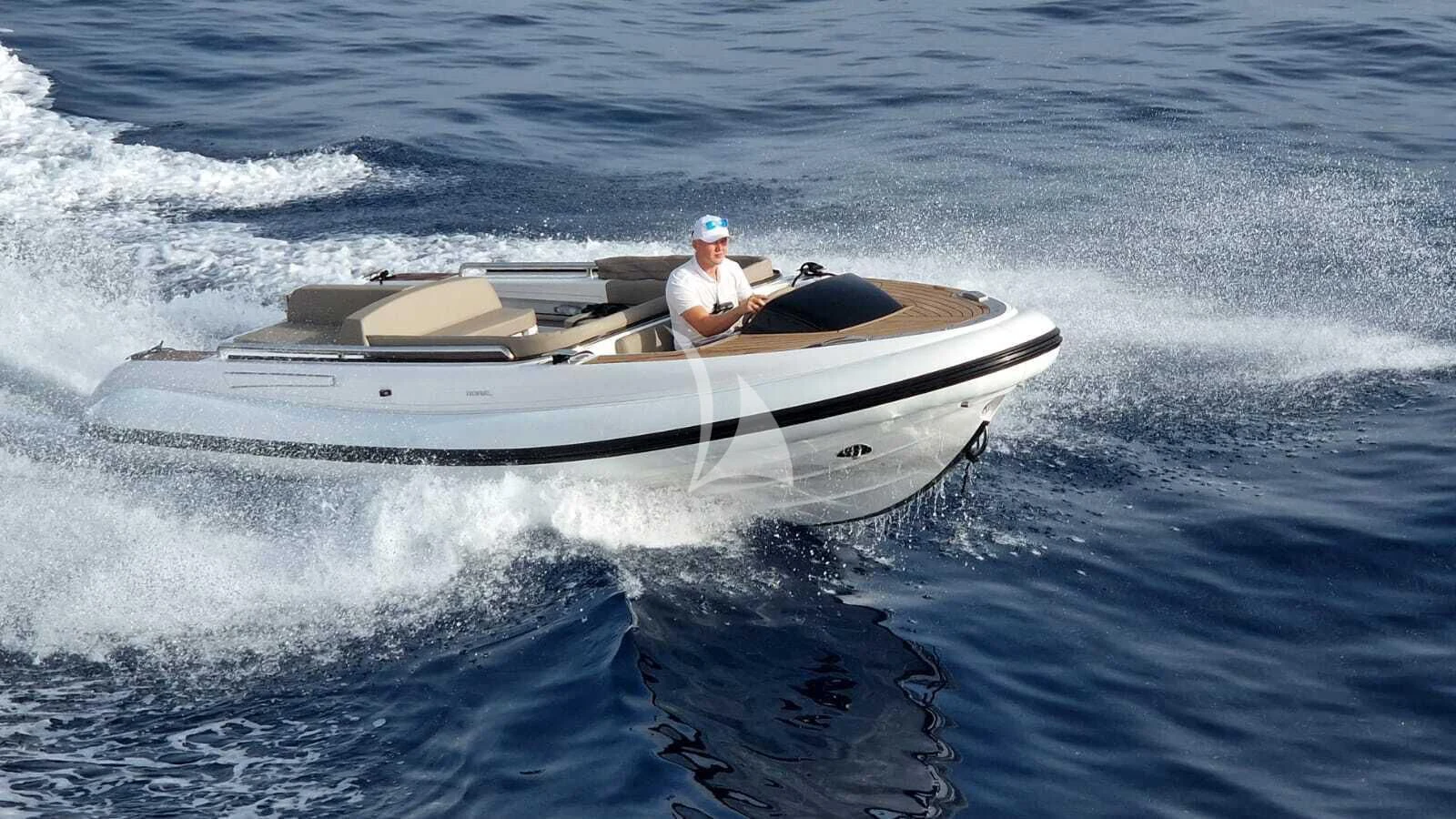a person in a white boat aboard ASYA Yacht for Sale