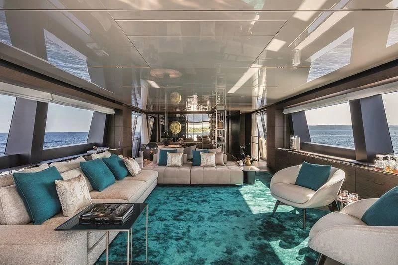 a room with a blue rug and a blue rug aboard FOUR FLOWERS III Yacht for Sale