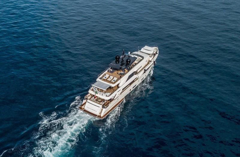 a boat in the water aboard FOUR FLOWERS III Yacht for Sale