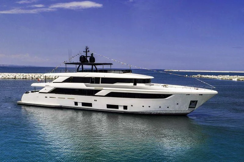 a white yacht in the water aboard FOUR FLOWERS III Yacht for Sale