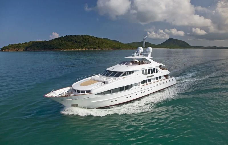 a white yacht on the water aboard THE LADY K Yacht for Sale