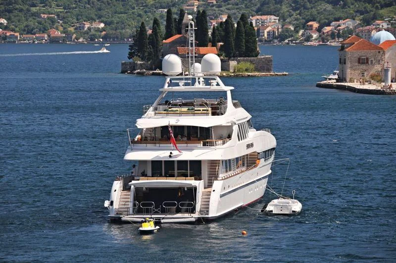 a large white boat in the water aboard THE LADY K Yacht for Sale