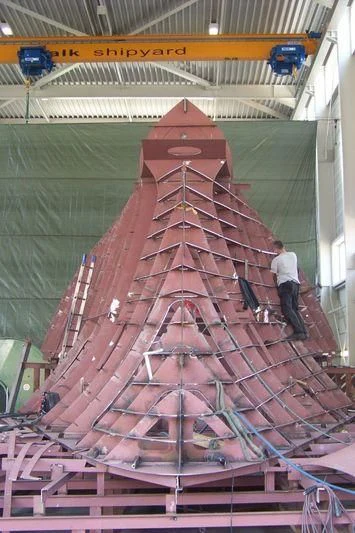 a person working on a red roof aboard THE LADY K Yacht for Sale