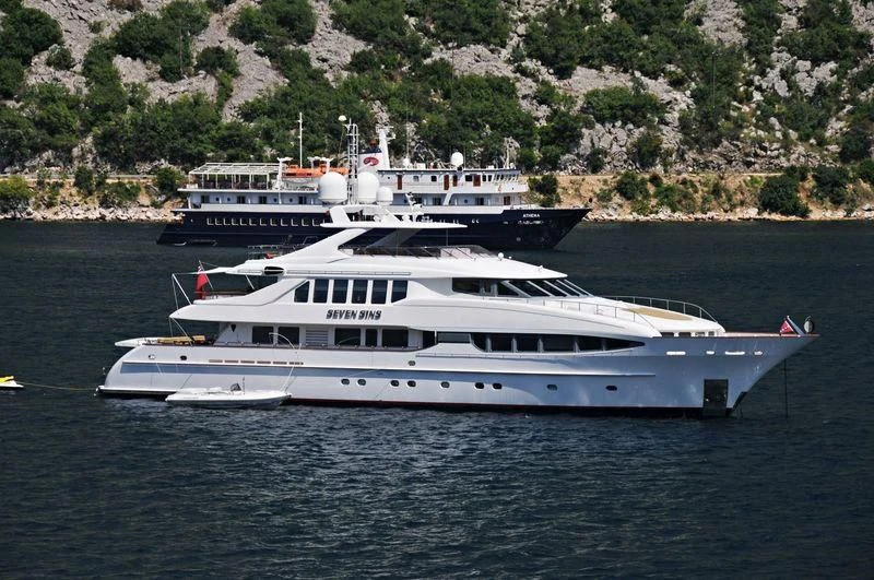 a couple of boats on the water aboard THE LADY K Yacht for Sale