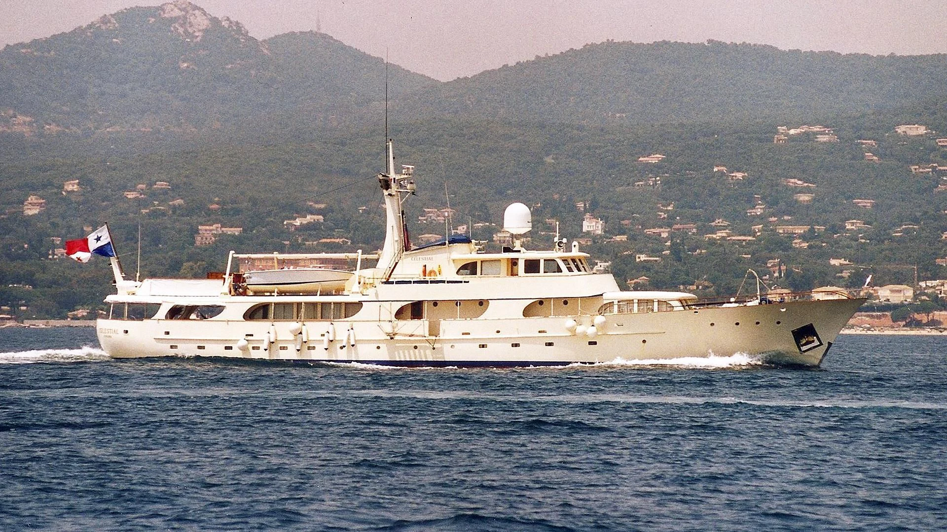 a large white boat in the water aboard CELESTIAL Yacht for Sale