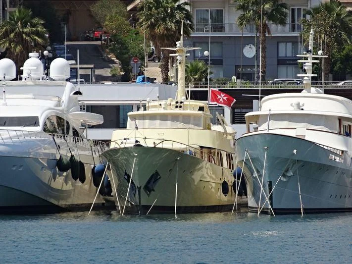 several boats docked at a pier aboard CELESTIAL Yacht for Sale