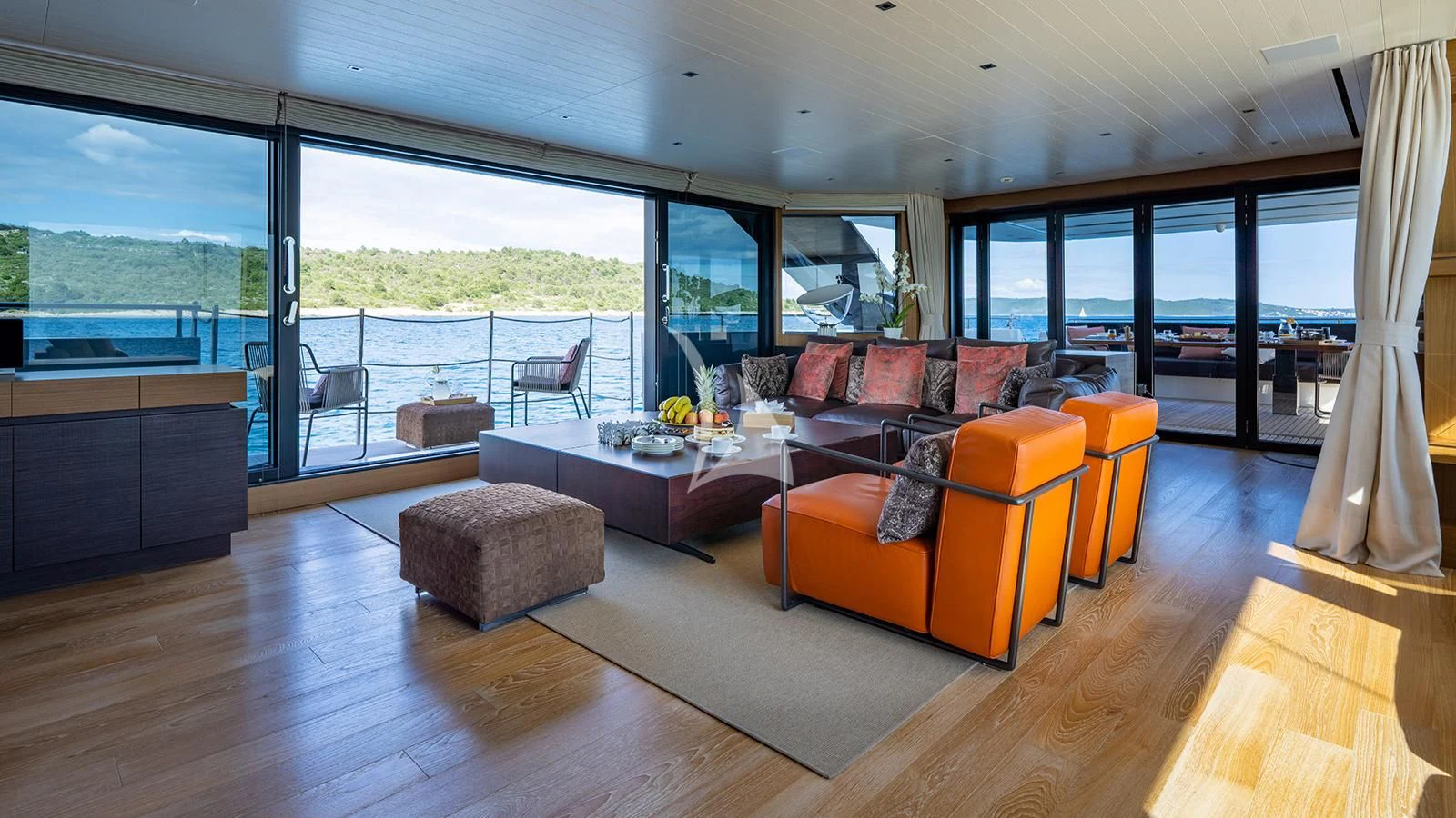 a living room with a large window aboard JOURNEY Yacht for Sale