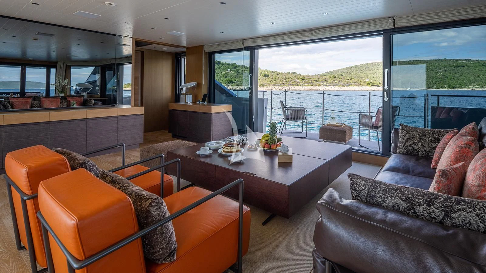 a living room with a large window aboard JOURNEY Yacht for Sale