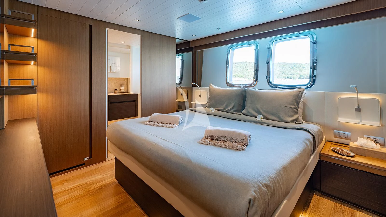 a bed in a room aboard JOURNEY Yacht for Sale