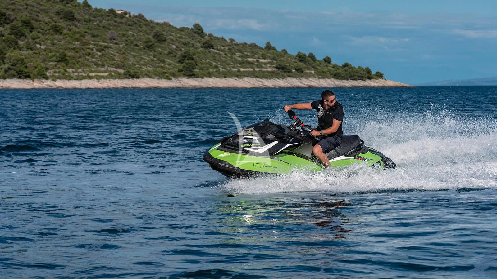 a man on a jet ski aboard JOURNEY Yacht for Sale
