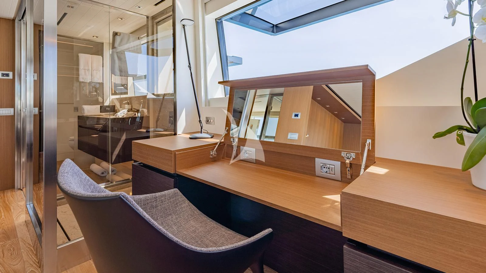 a room with a desk and a chair aboard JOURNEY Yacht for Sale