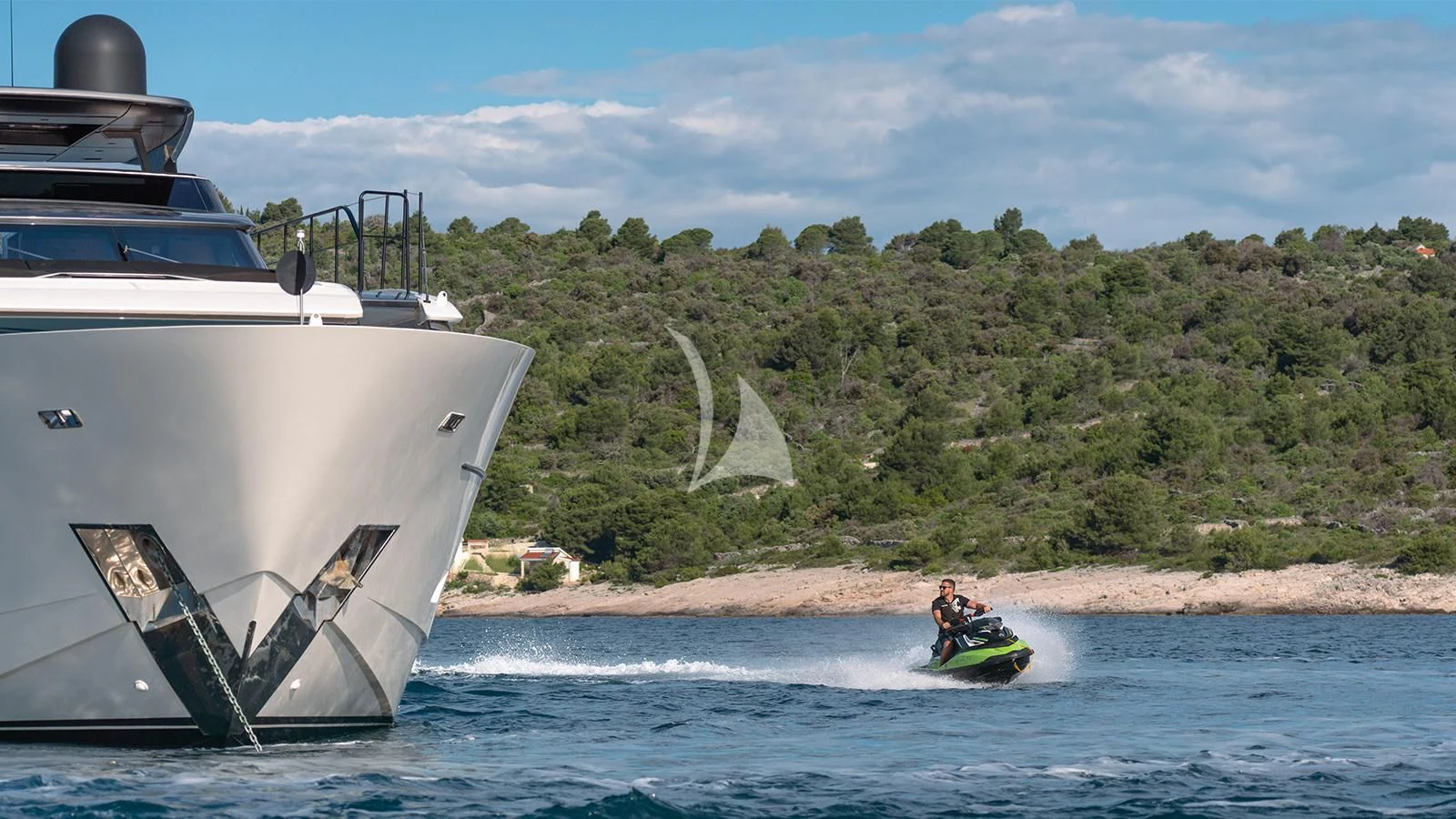 a boat and a motorcyclist on the water aboard JOURNEY Yacht for Sale
