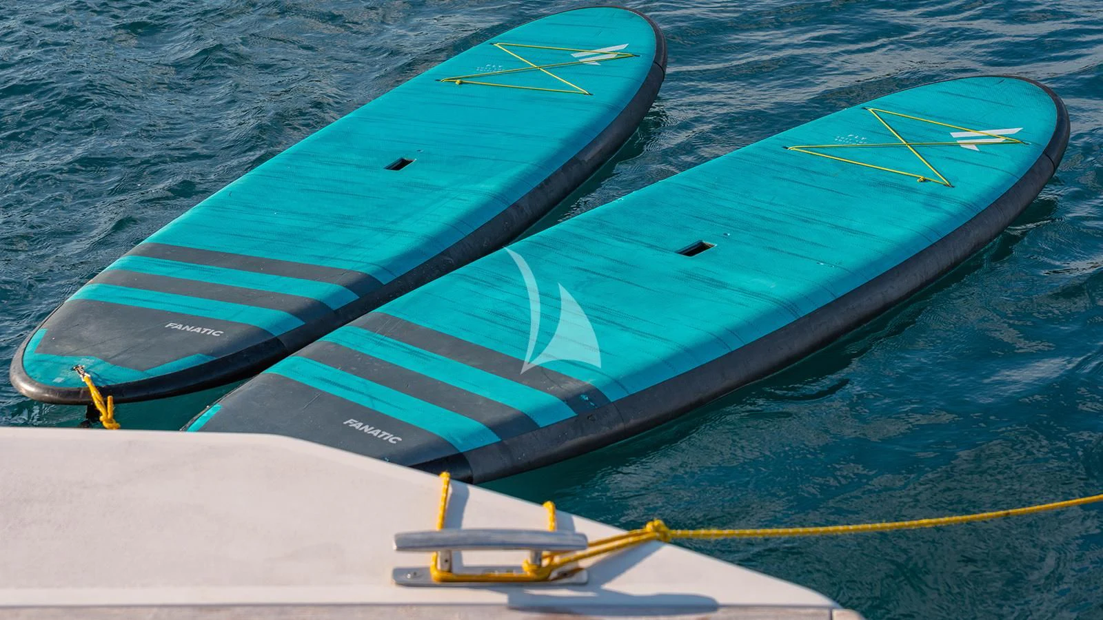 a green and black jet on a runway aboard JOURNEY Yacht for Sale