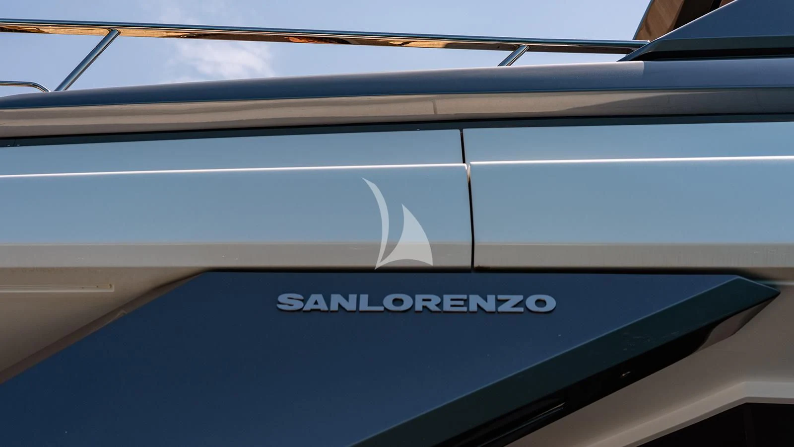 a close-up of a blue car aboard JOURNEY Yacht for Sale