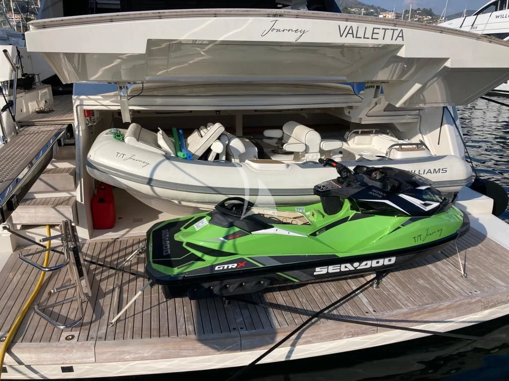 a boat on a deck aboard JOURNEY Yacht for Sale